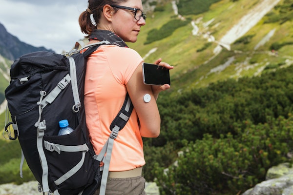 woman-wearing-continuous-glucose-monitor