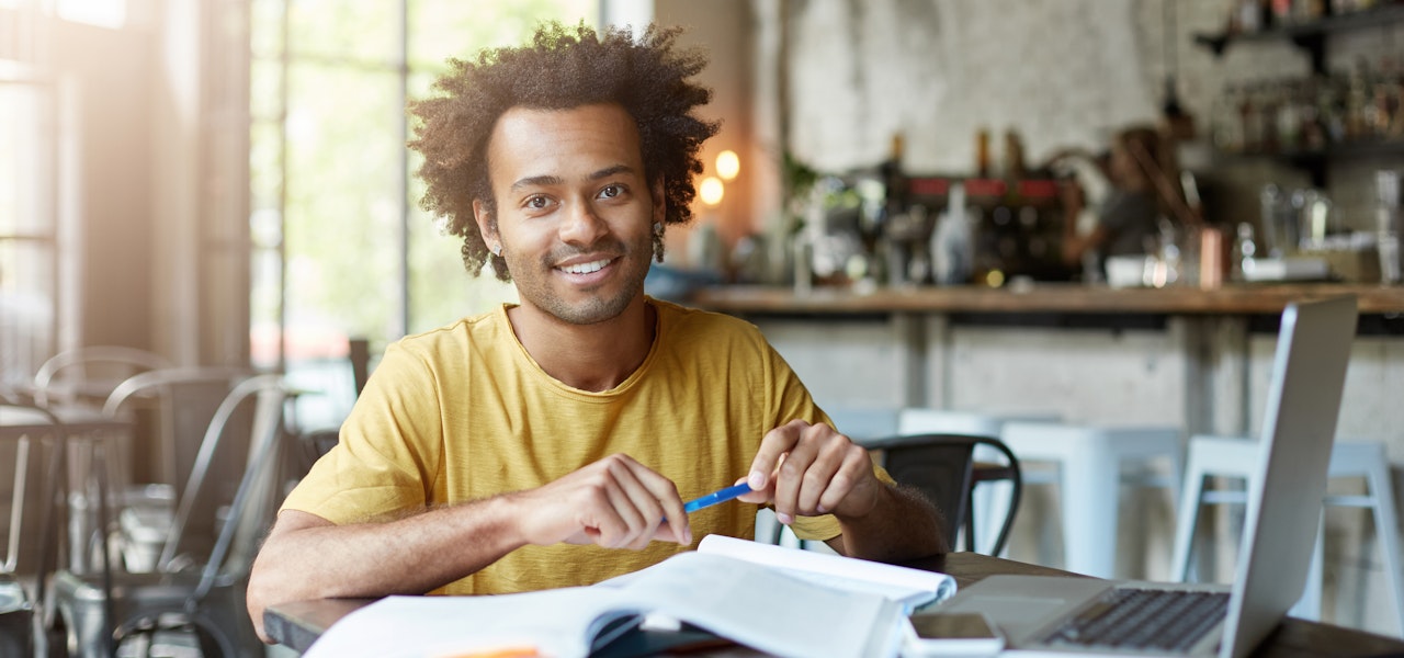 man-studying-at-table