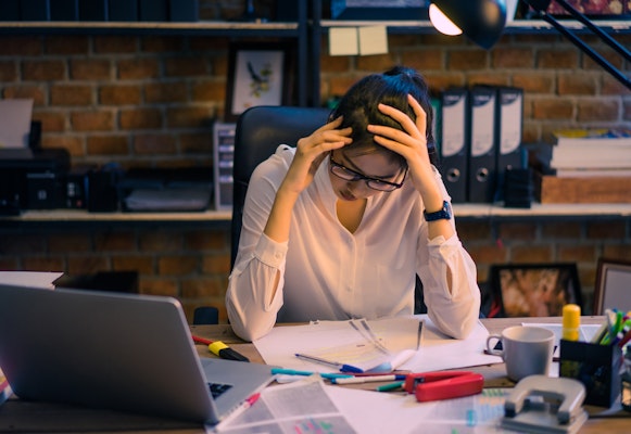 stressed-woman-at-desk