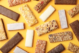 high-protein-snacks-on-yellow-background