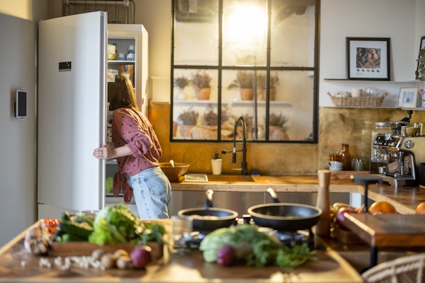 woman-looking-in-fridge