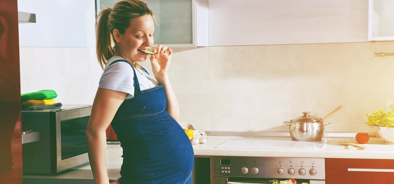 pregnant-person-cooking