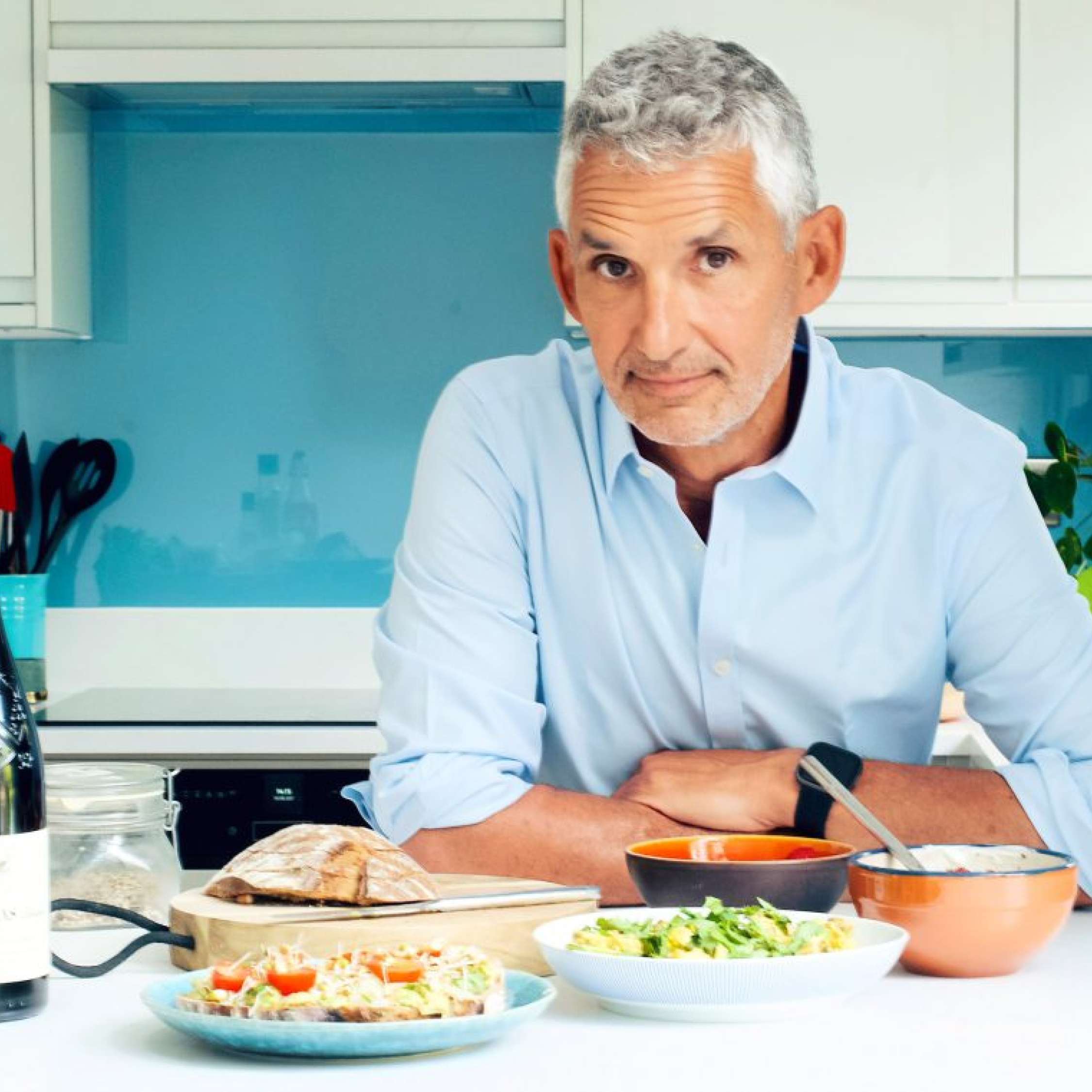 Professor Tim Spector with a range of different food