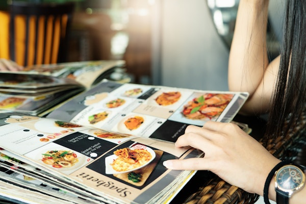 person-considering-a-menu