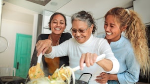 mother-and-daughters-cooking