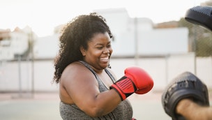 boxing-training-outside-while-smiling