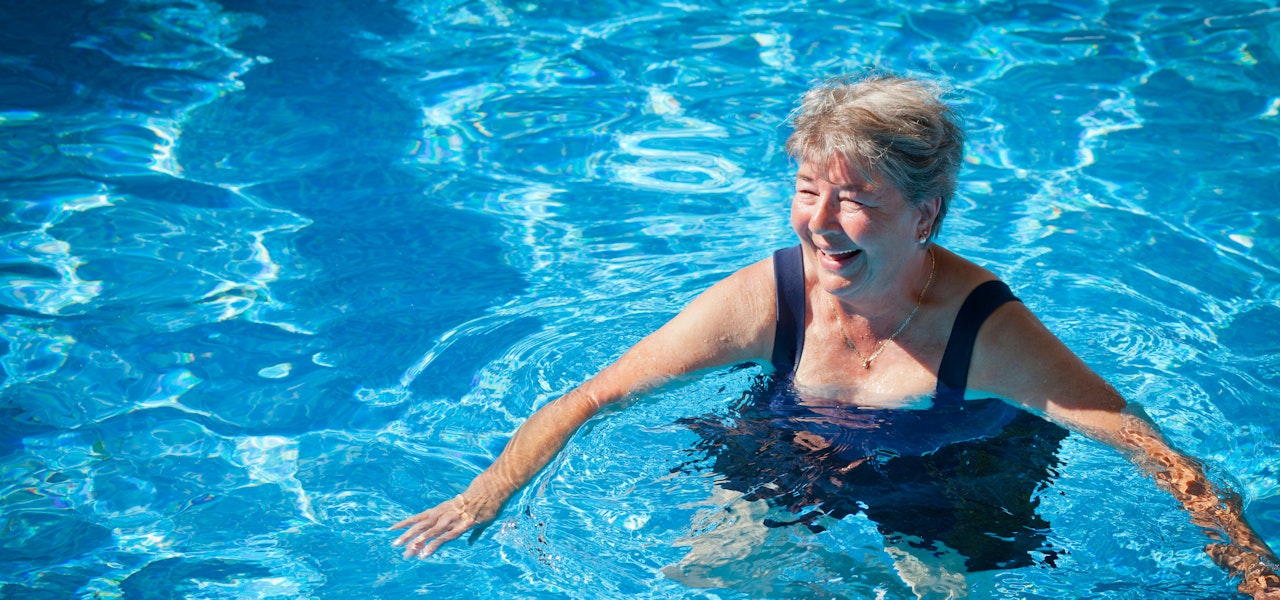 an-older-person-happily-swimming