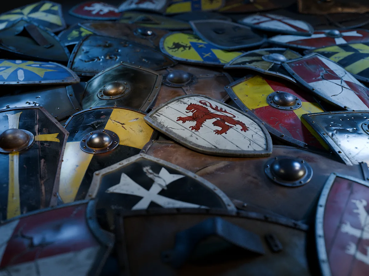 A pile of heraldic shields with painted crests