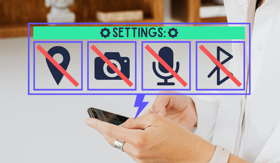 A pair of hands clutches a phone while a digital window pops up that reads "Settings" and has location, camera, microphone, and bluetooth icons in it that are all have red lines through them