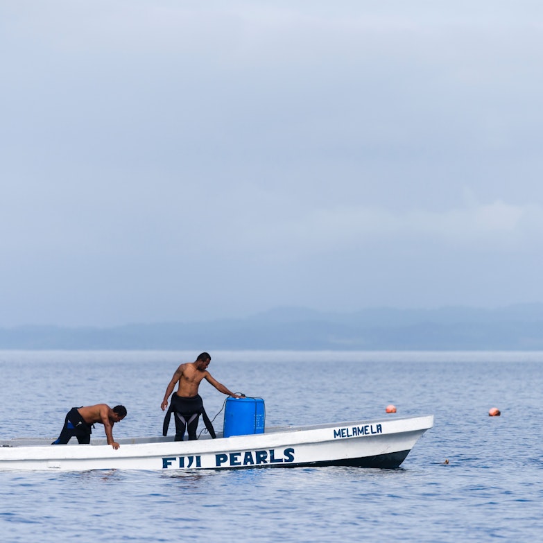 Taucher auf einem Boot