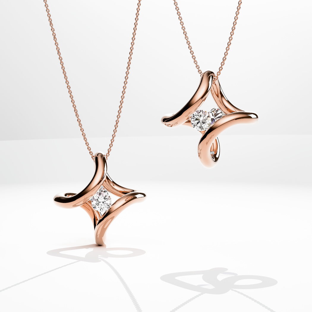 Niessing Neuheiten Kollektionsbild - zwei Ära-Anhänger in Fine Rose mit einem Brillanten