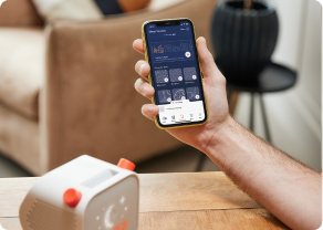 Parent controlling Yoto player with app