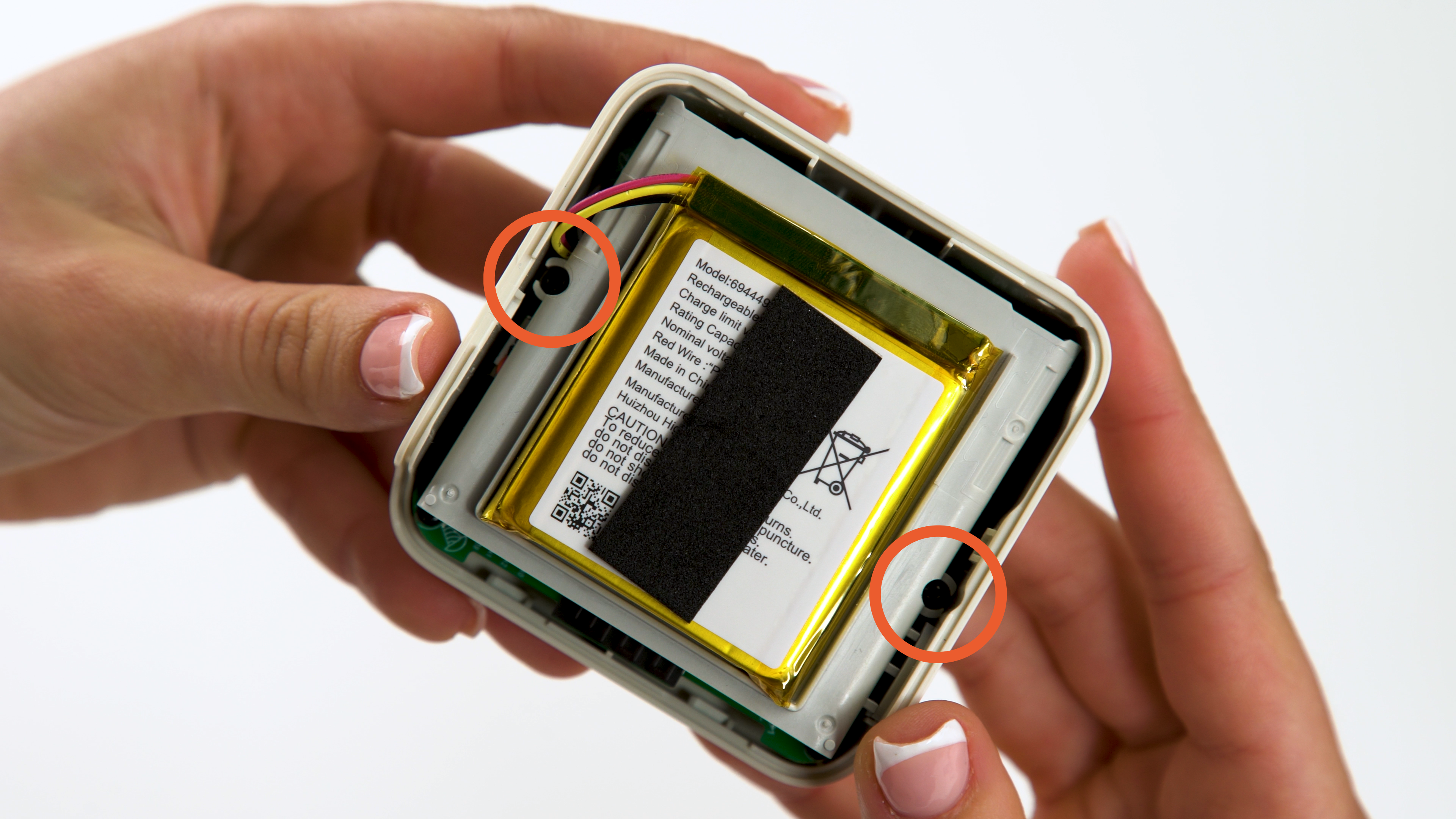 battery assembly is held in place by two philips screws found on either side