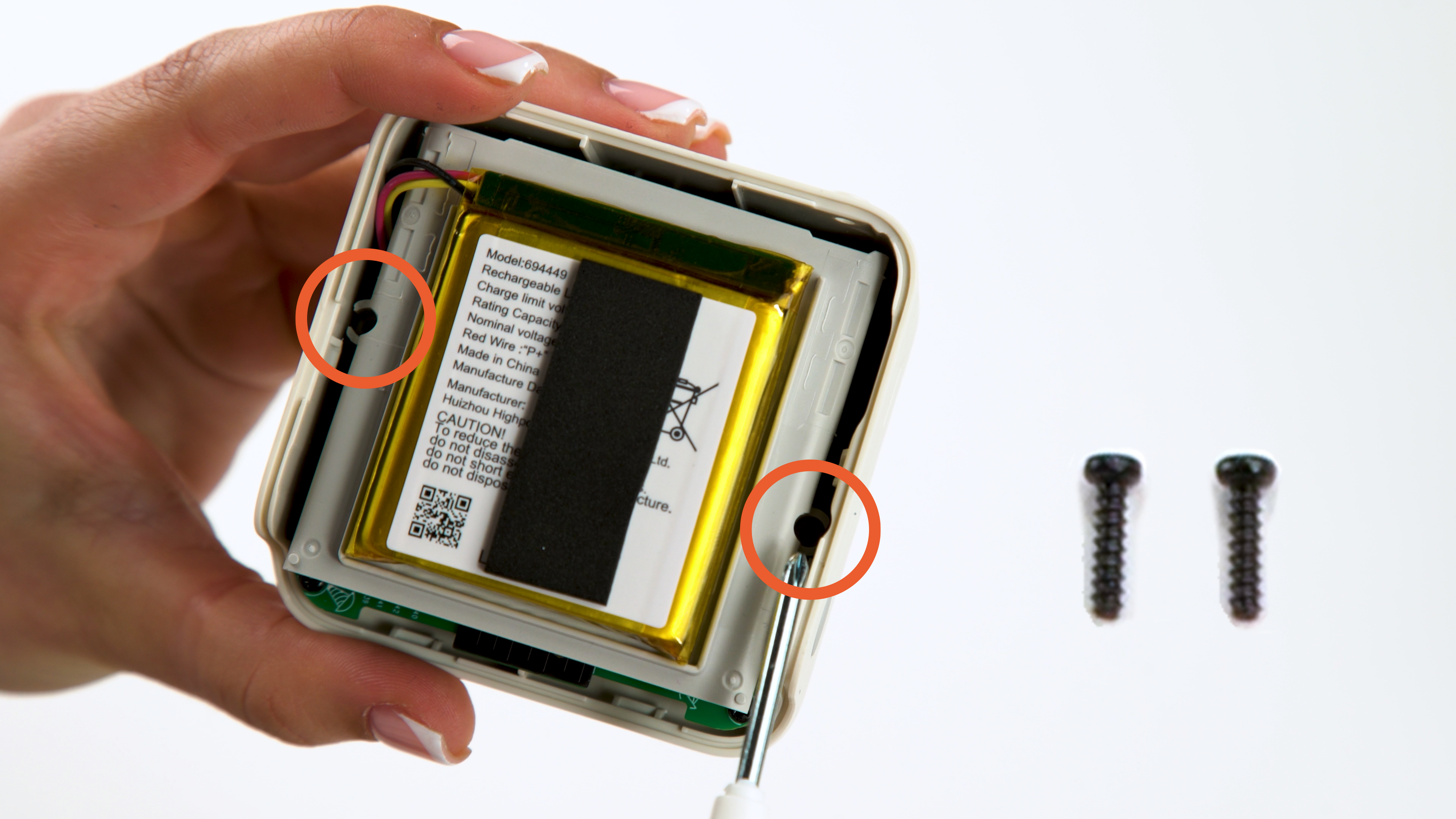Use two longer philips screws provided