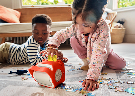 Child putting card in Player