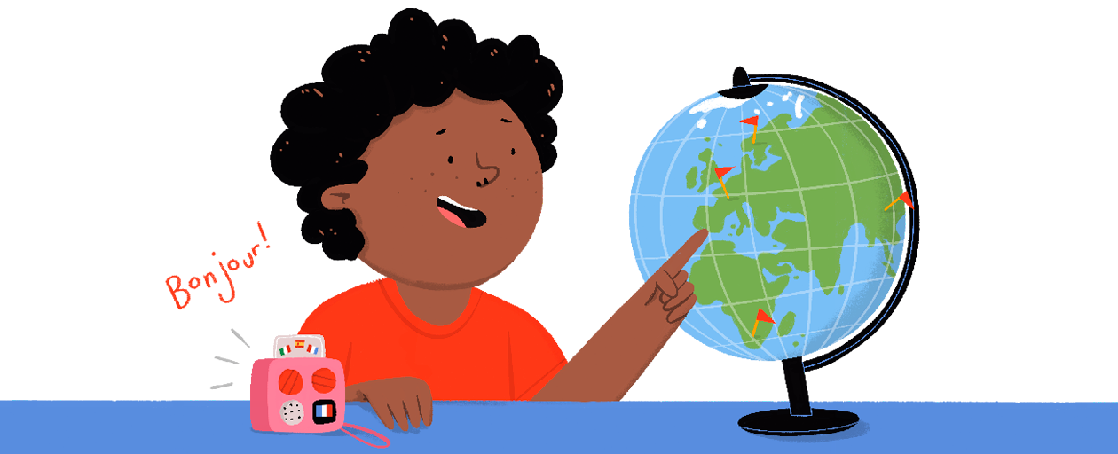 Illustration of boy sat at a table with the Yoto Mini pointing at the world globe