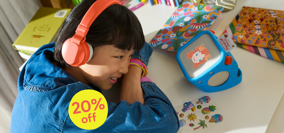 End of Financial Sale, 20% off. Image shows child listening to a card in the Yoto Player with the Yoto Headphones