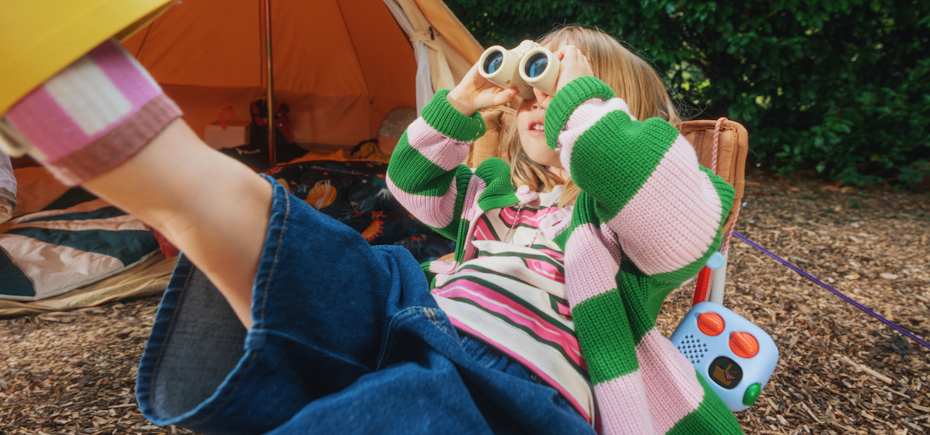 Child outside with Yoto Mini Gen 4