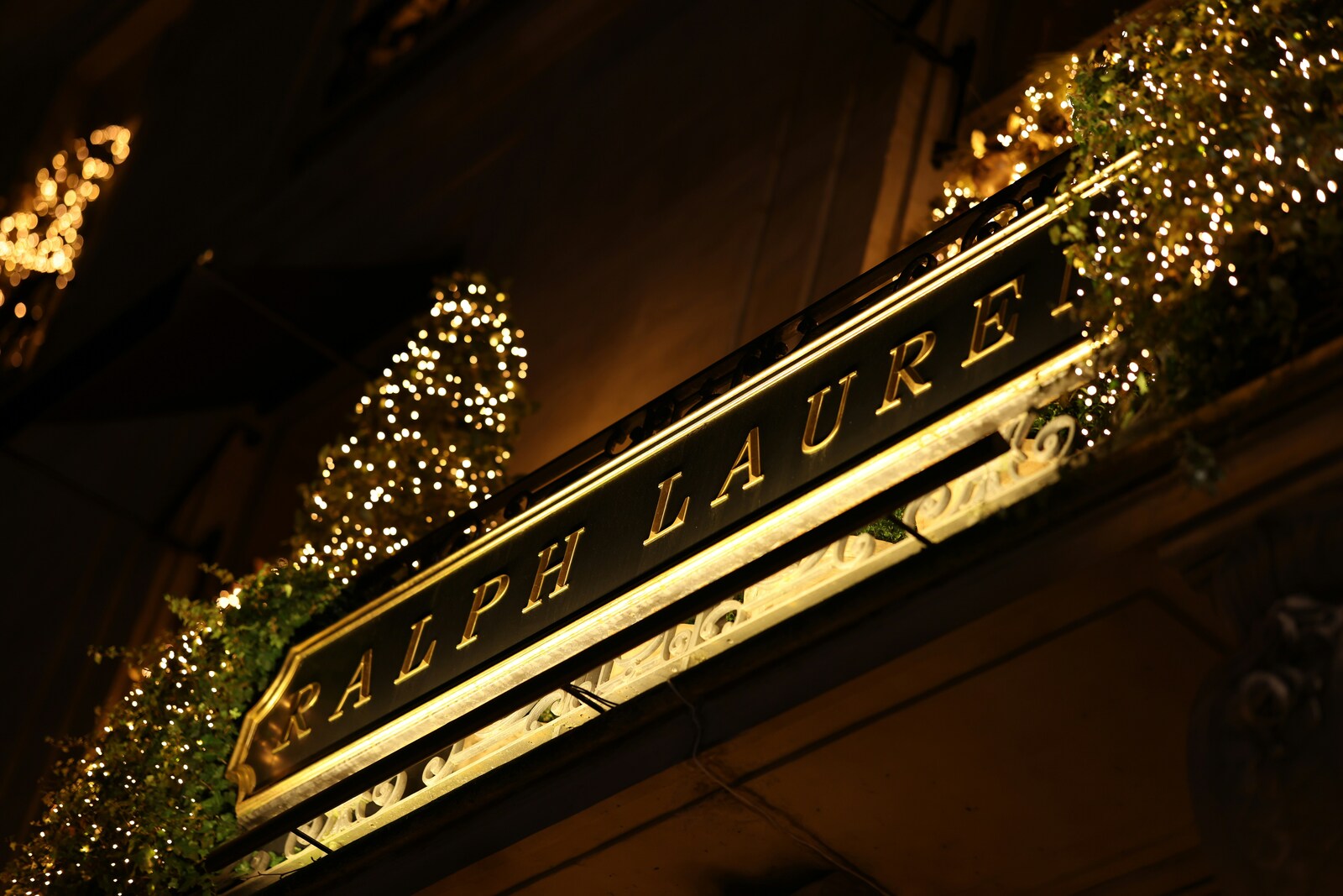 Ralph Lauren logo in front of a building