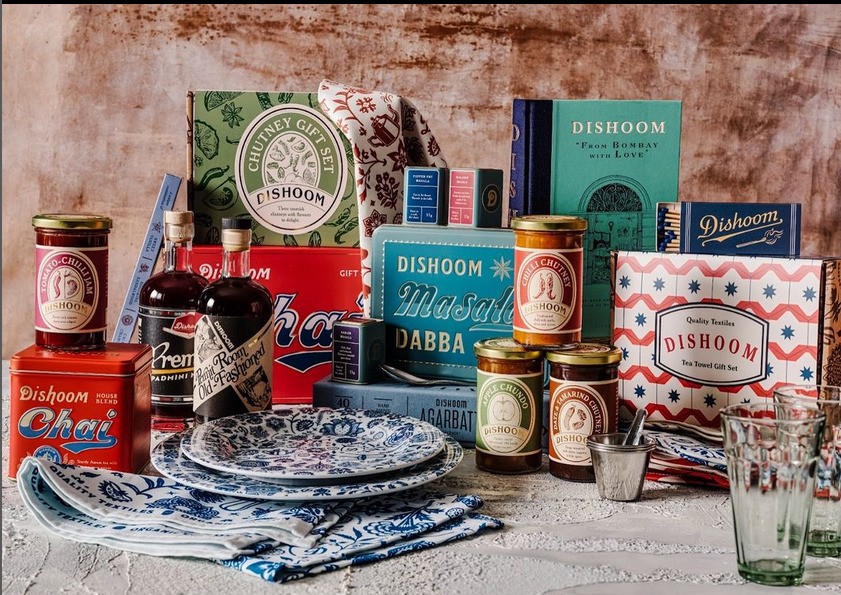 Colorful plates, jars, books, and tablecloths