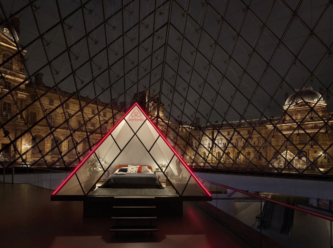 A full bedroom suite inside a glass pyramid