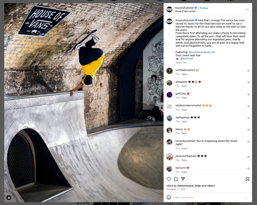 A man in yellow skates towards the ceiling of a tunnel