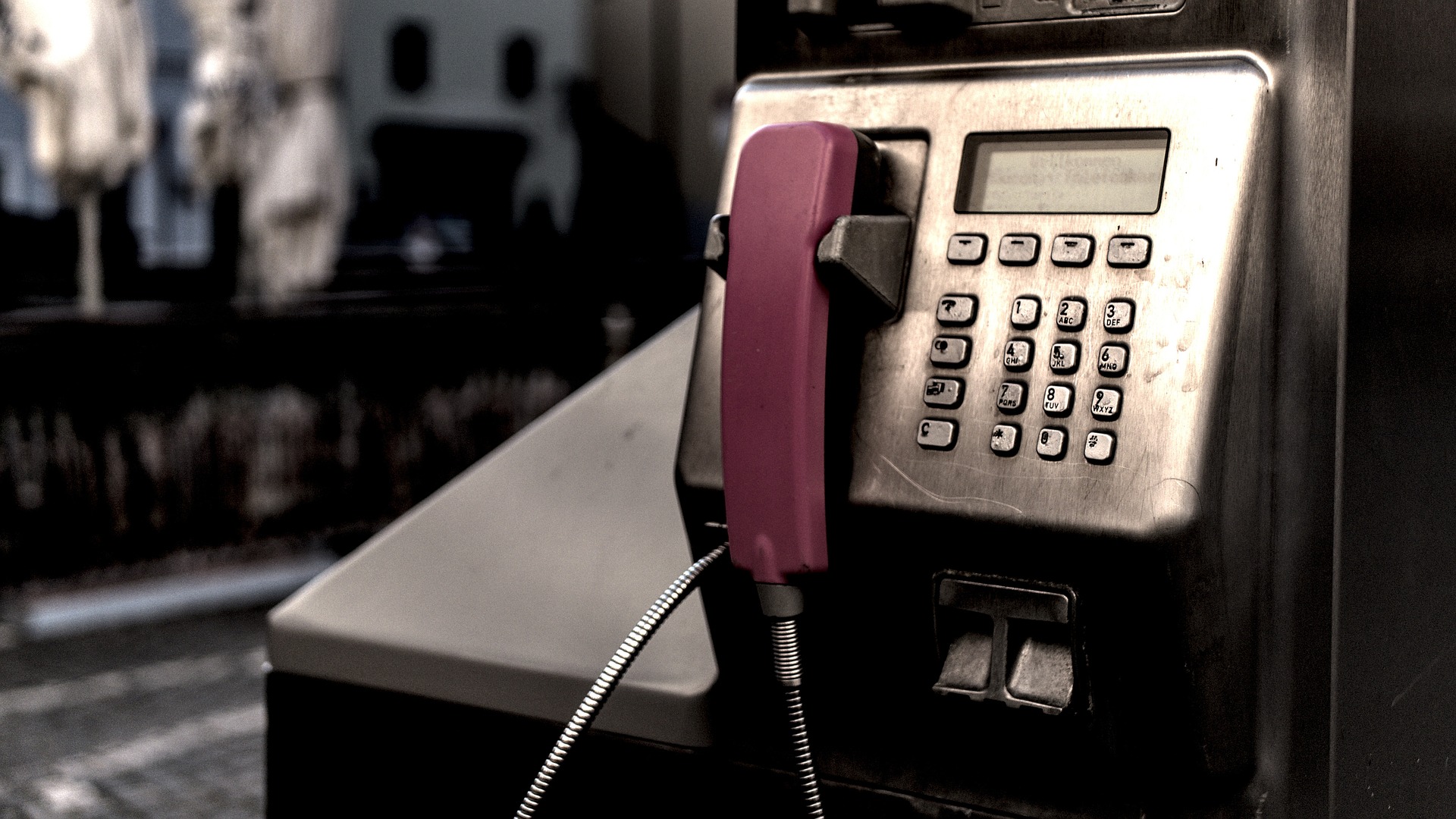 Payphone on a sidewalk