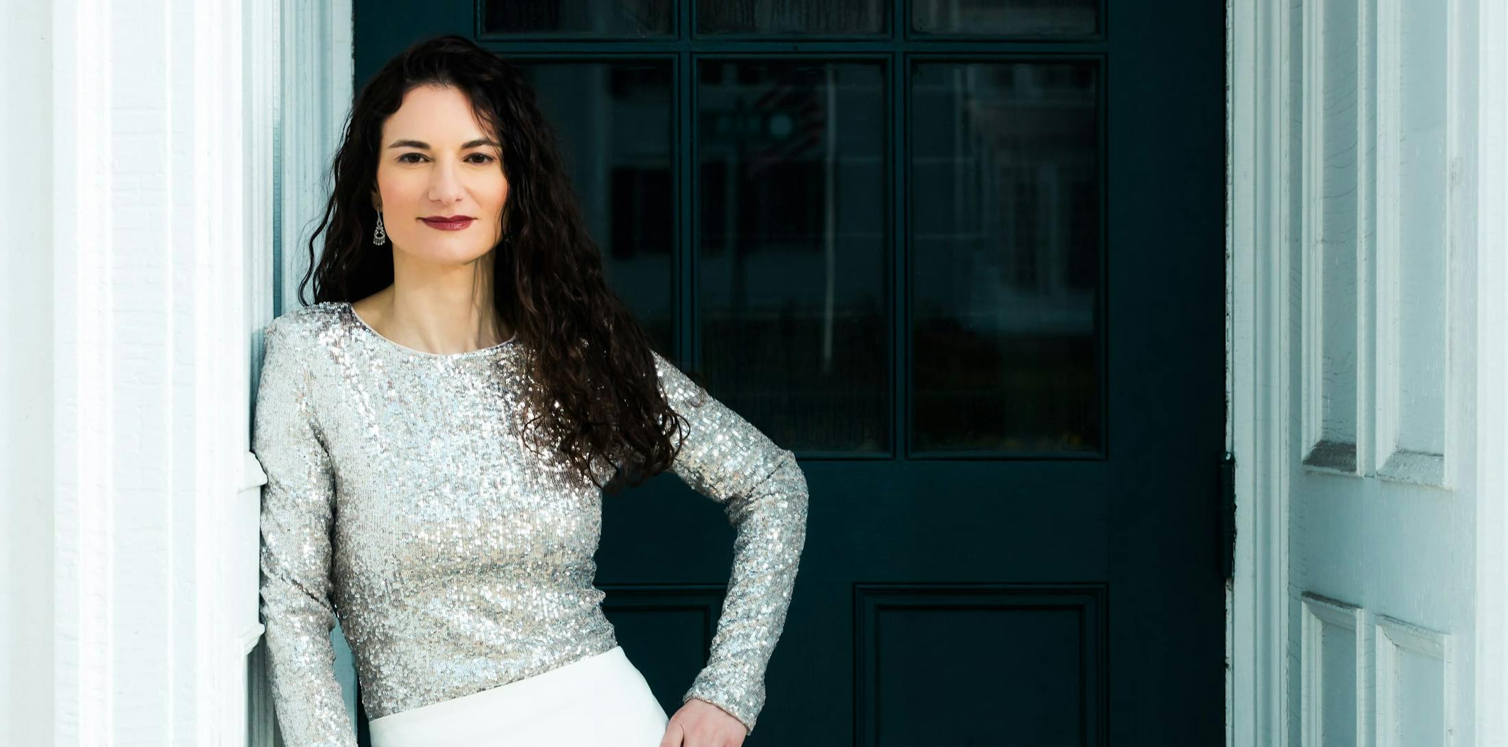Woman in a silver top
