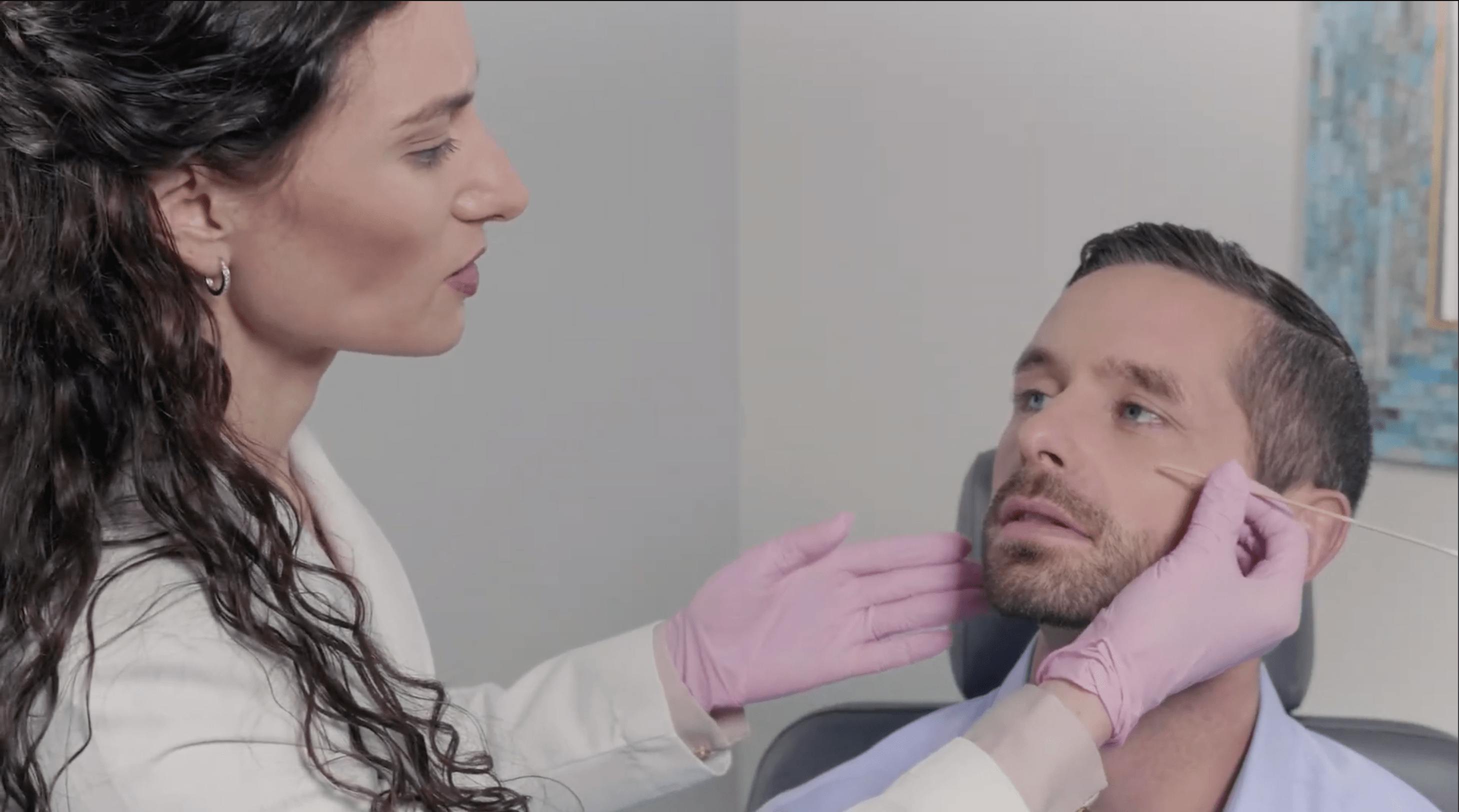 Dr. Lamoureux with patient