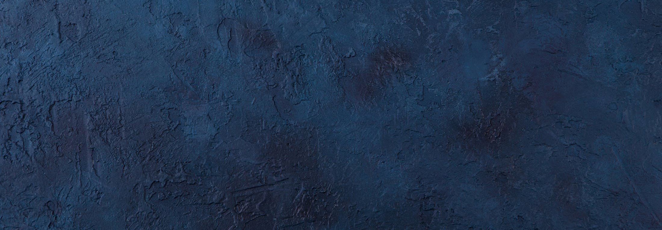 close up of a blue painted wall