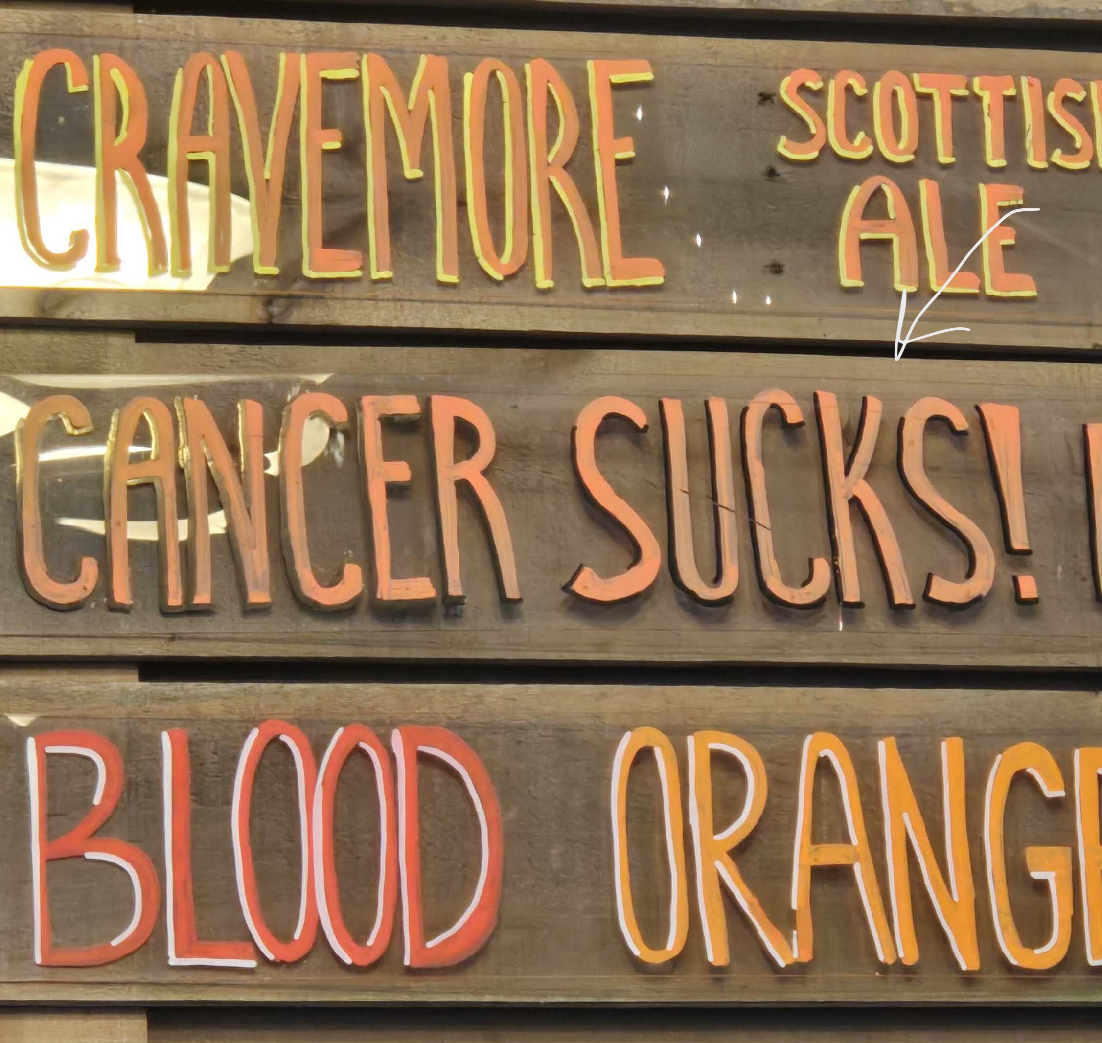 beer tap list with a beer named cancer sucks