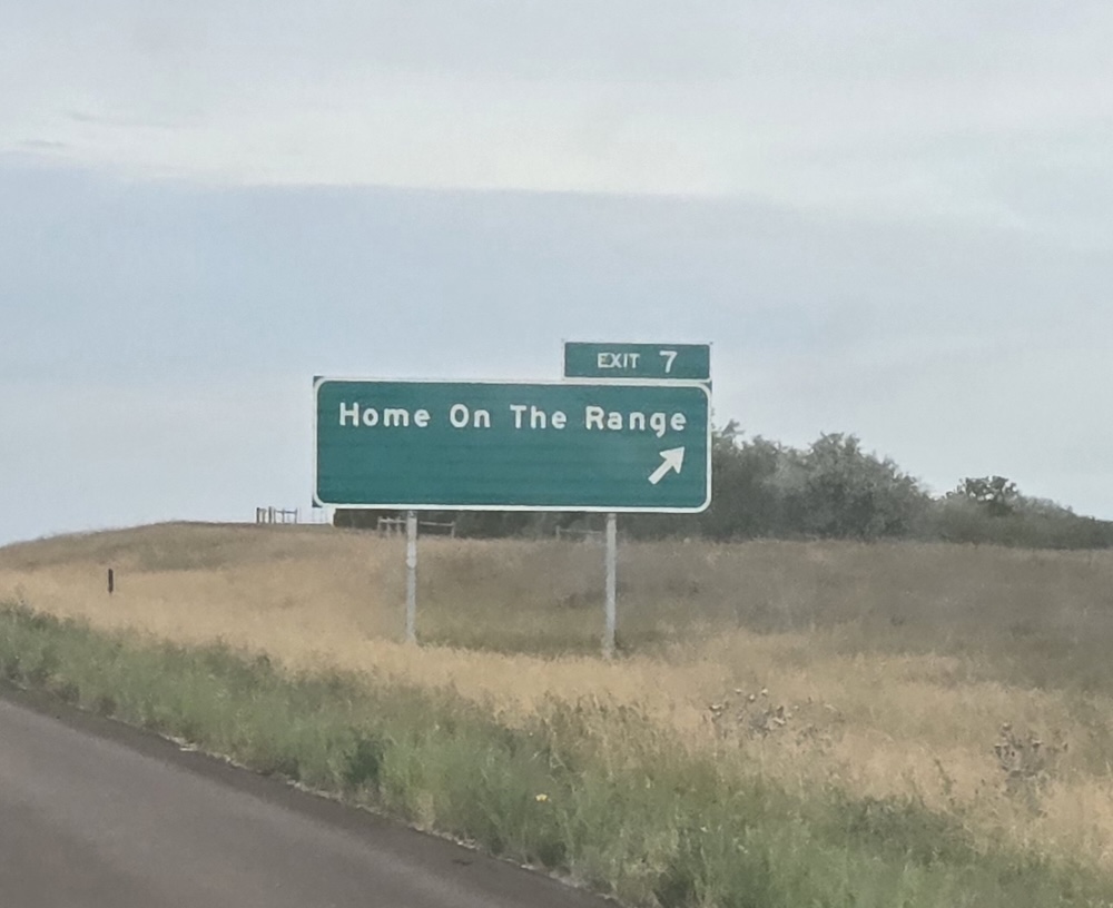 highway exit sign saying exit 7 Home on the Range