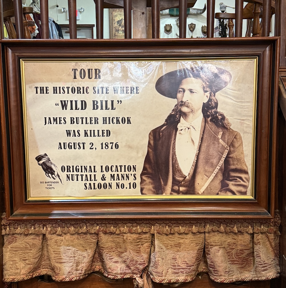 plaque of Wild Bill Hickok stating this is the historical site where he was killed