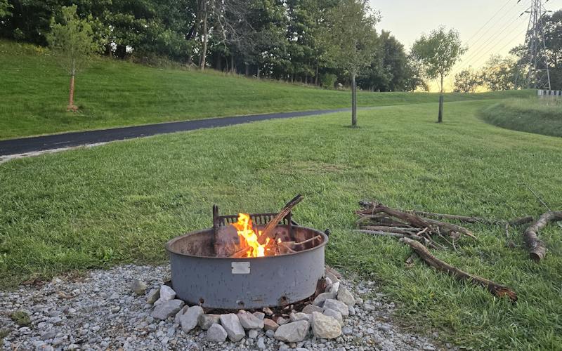 a firepit with a blazing fire