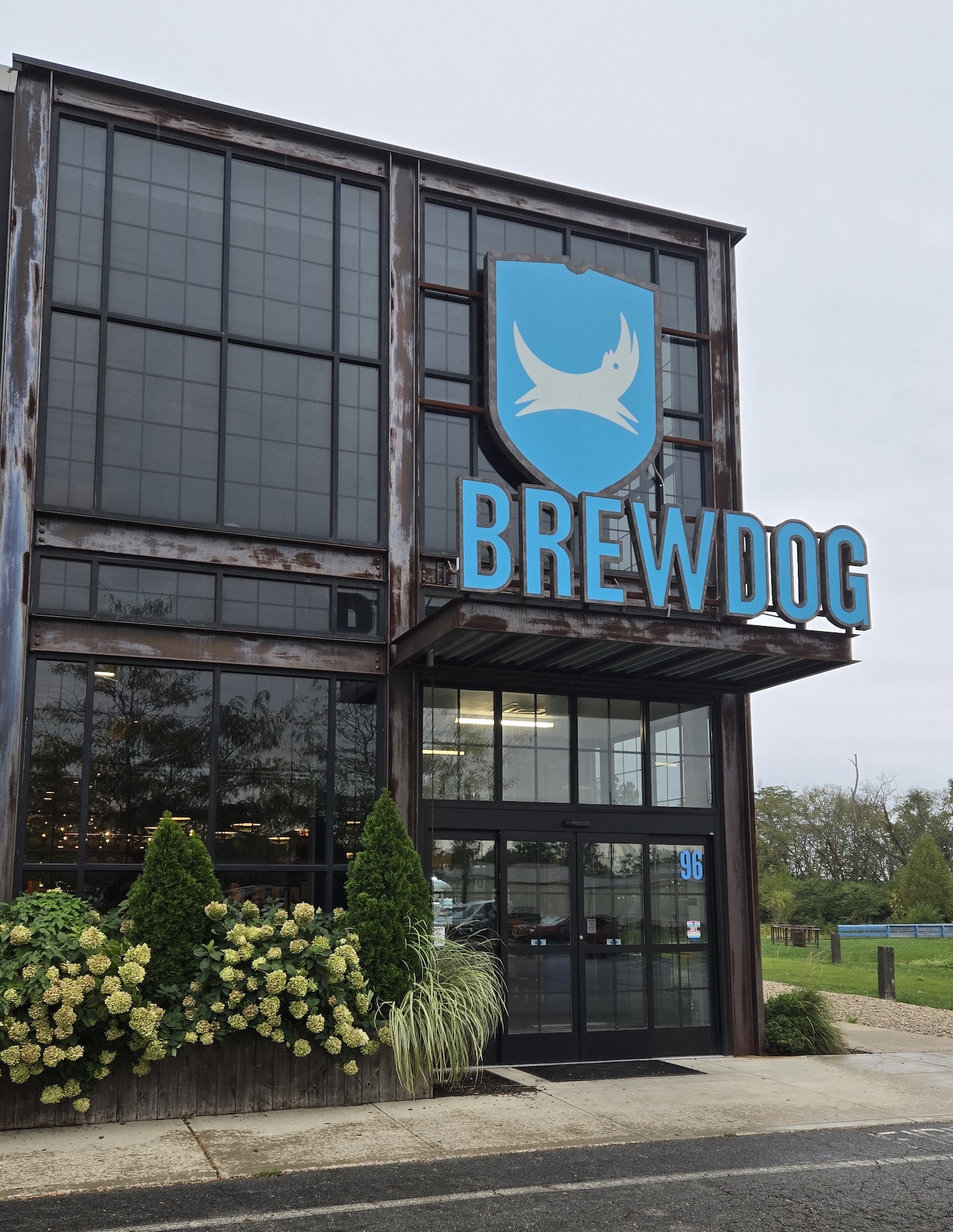the outside of Brewdog Dog Tap house with entrance and blue Brewdog name and logo