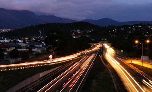 Time-lapse photo of the Tasman Highway at night time