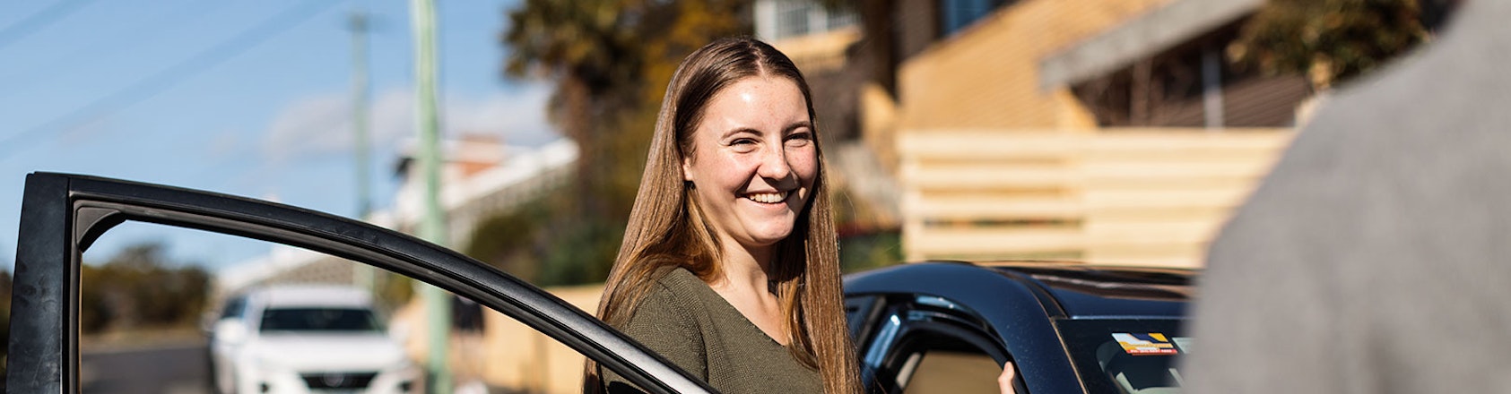 Learner driving getting car keys.