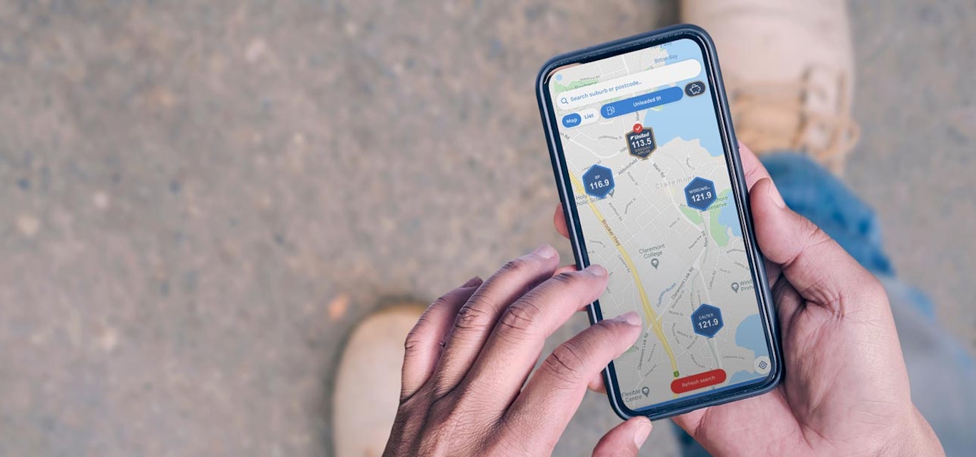 First-person view of someone using the RACT Fuel SAver app on a mobile phone