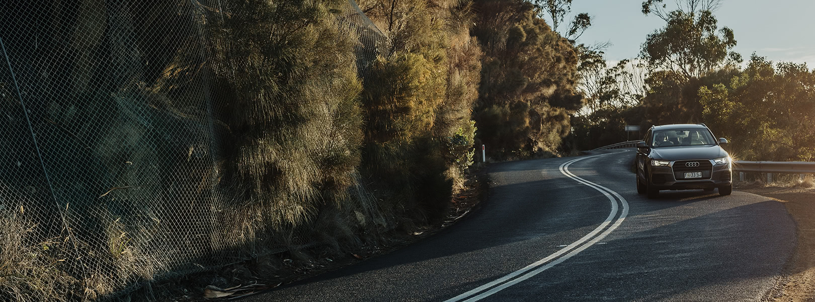 Family car driving along highway near Orford  