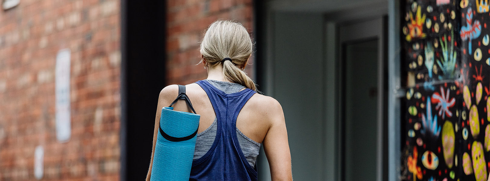 Woman going to yoga class