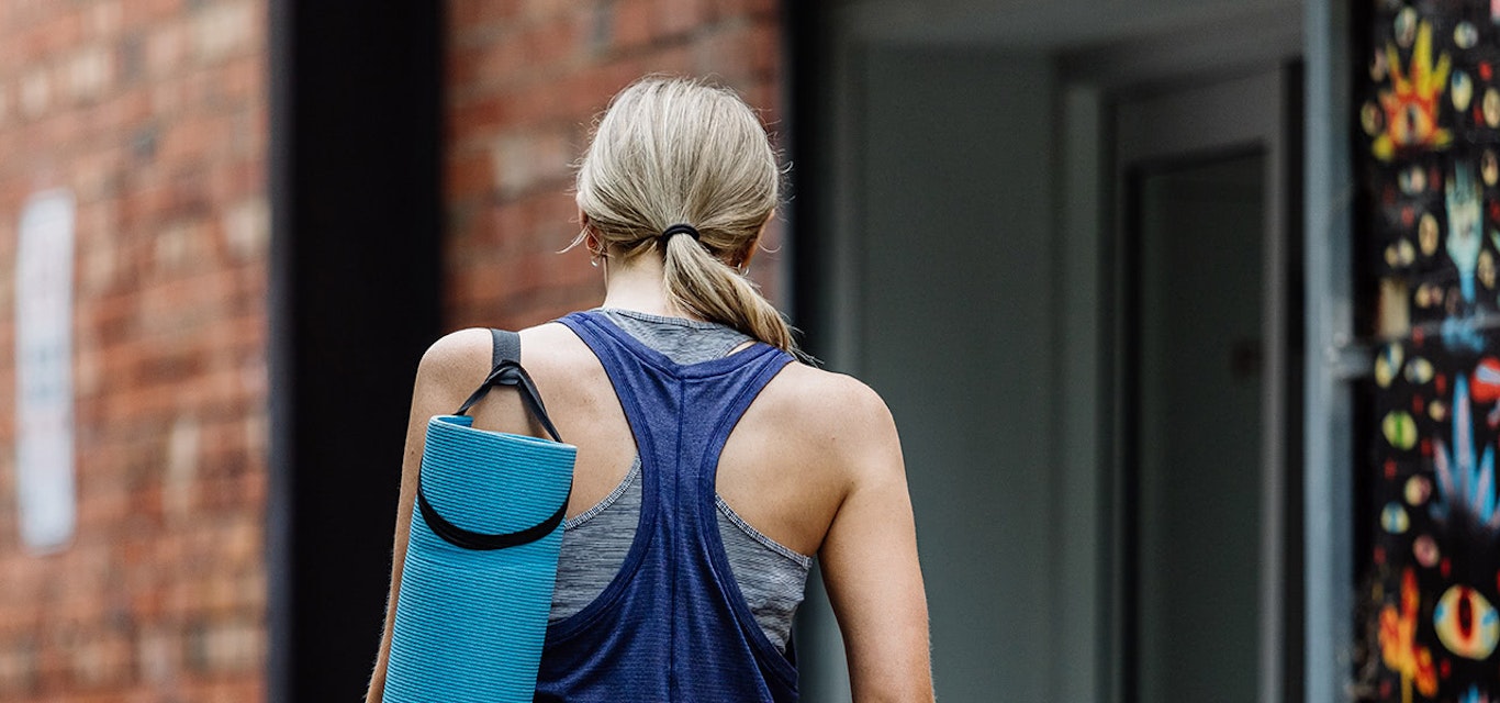 Woman going to yoga class