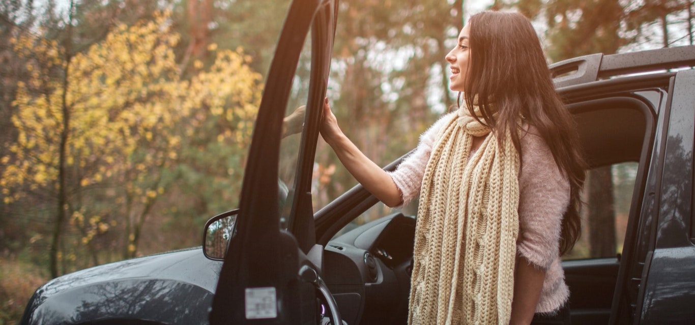 Person exiting a car.
