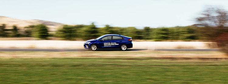 Electric vehicle driving on highway