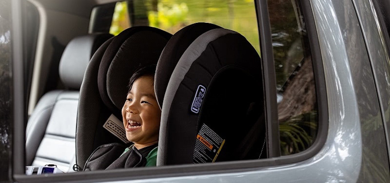 Child in back seat of car