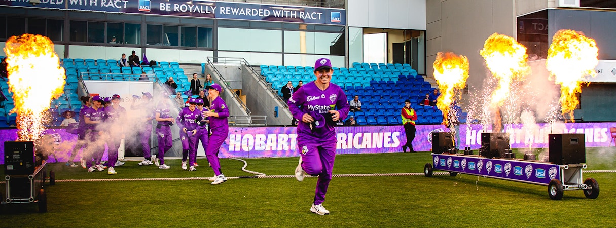 Corinne Hall running onto the ground