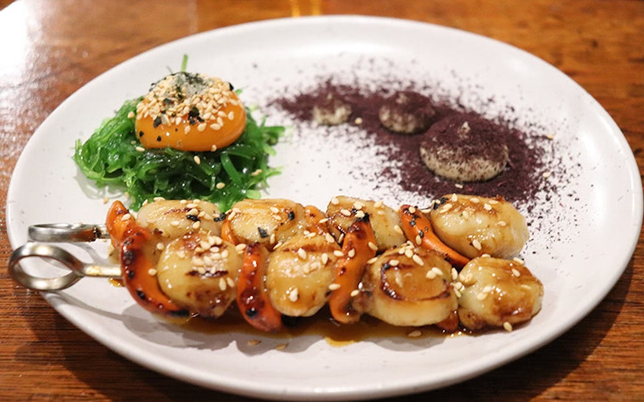 Fresh Tassie scallops with wakame and yolk.