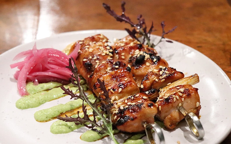 Chicken thing with spring onion and pickles.