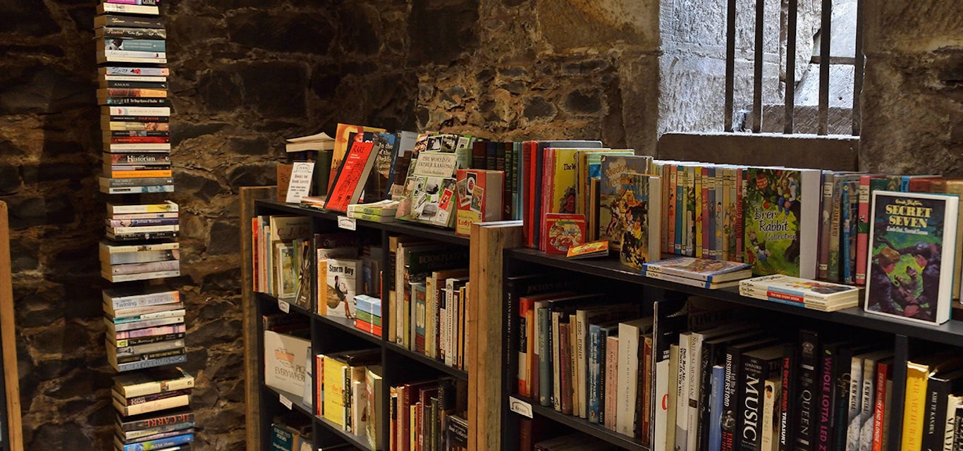 A variety of books lining the historic walls of The Book Cellar A variety of books lining the historic walls of The Book Cellar.
