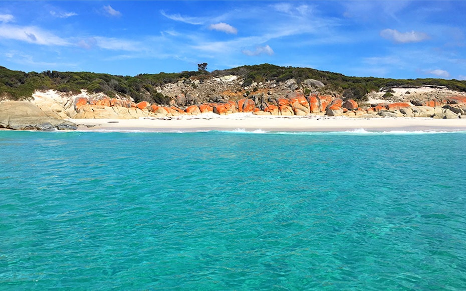 Crystal clear water at Binalong Bay