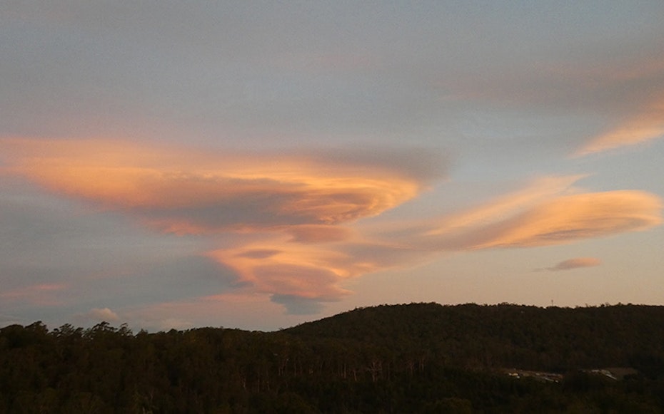 Swirling cloud patterns in teh sky at dusk